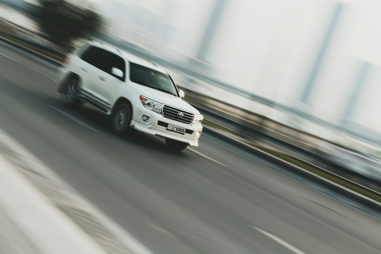 White Land Cruiser on a UAE highway